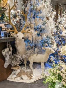 Cerfs et sapins de Noël