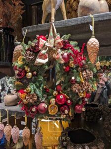 Promotion sur certains sapins et couronnes de Noël